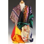 An Oscar de la Renta silk scarf, designed as repeating paisley panels in purple, blue and grey