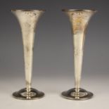 A near pair of Edwardian silver posy vases, Chester 1911 and Birmingham 1912, S Blankensee & Sons