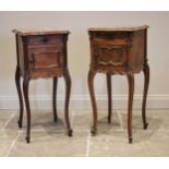 A well matched pair of Louis XV style kingwood and rouge marble bedside cupboards, late 19th/early