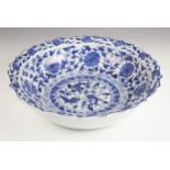 A large Chinese porcelain blue and white bowl, Yongzheng mark but later, of circular form with