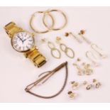 A selection of jewellery, to include a pair of yellow metal hollow hoop earrings, fastening