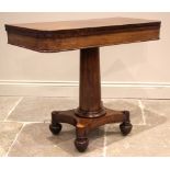 An early Victorian mahogany tea table, the folding rectangular top with rounded corners, upon a