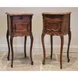 A well matched pair of Louis XV style kingwood and rouge marble bedside cupboards, late 19th/early