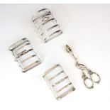 A pair of George V silver toast racks, Mappin and Webb, Sheffield 1927, the four division toast rack