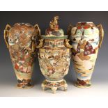 A garniture of three Japanese Satsuma porcelain vase, Meiji Period (1868-1912), comprising; a temple