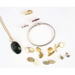 A selection of jewellery, including a green striated hardstone necklace, the oval hardstone within