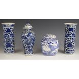 A pair of Chinese porcelain blue and white rouleau vases, 19th century, each of cylindrical form and