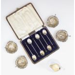 A selection of silver items, to include a set of four Edwardian silver open salts, William Aitken,