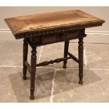 A 19th century walnut occasional table, the associated over-sailing top with a dentil frieze above a