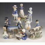A selection of Royal Copenhagen porcelain figures, 20th century and later, to include: a snowman,