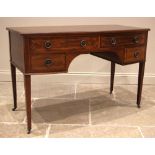 An Edwardian mahogany bowfront dressing table/desk, formed as an arrangement of four small