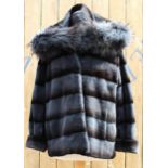 A ladies hooded and reversible mink and Finn Racoon fur winter jacket, late 20th century, with