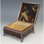 A George V silver mounted tortoiseshell jewellery casket, of square form raised on four bracket