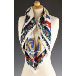 A V-E day commemorative scarf, the silk scarf with central wildflower spray, within a forget-me-
