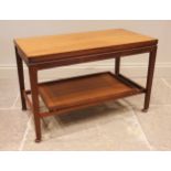 A Remploy metamorphic teak coffee table, mid 20th century, the rectangular hinged top over a tray