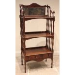 A mahogany etagere/what not, 20th century, the upper tier with a mirrored back over two further