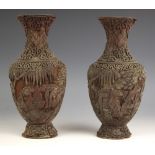 A pair of Chinese Cinnabar lacquer vases, 18th/19th century, each vase of narrow baluster form and