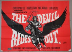A UK quad cinema poster for the Hammer Film production of Denis Wheatley's THE DEVIL RIDES OUT