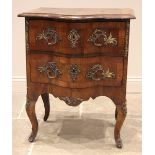 A French Louis XV style walnut serpentine chest of drawers/commode, late 18th/early 19th century,