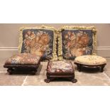 A mid 19th century upholstered walnut footstool, of canted rectangular form, with a tapestry seat,