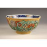 A Chinese porcelain famile verte bowl, 18th century, the exterior decorated with flowering peonies