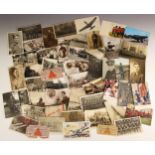 WORLD WAR II INTEREST: A collection of over eighty postcards, photocards and photographs depicting