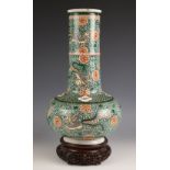 A large Chinese porcelain famille verte bottle vase, 19th century, externally decorated with