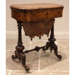 A Victorian burr walnut games/work table, the quarter veneered and marquetry inlaid hinged top,