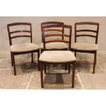 A set of four 'E Gomme, G-Plan' teak dining chairs, circa 1980, each chair with a rail back over a