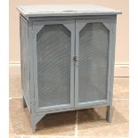 A vintage French painted pine food safe/hutch, formed with a pair of mesh panelled doors and side