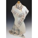 A Burberry silk scarf, designed as traditional Burberry check with an internal cream border, with
