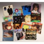 A selection of approximately sixty rock and pop 45rpm 7'' singles, the majority from the 1980s and