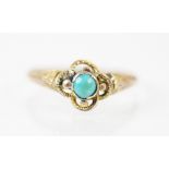 A late 19th century untested turquoise ring, the round cut turquoise set in a yellow metal rubover