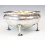 An Arts and Crafts George V silver bowl, Albert Edward Jones, Birmingham 1913, the circular bowl
