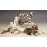 A selection of Royal Copenhagen porcelain animal figures, 20th century, including: a dog, printed