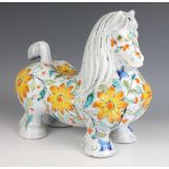 An Italian Mancioli 'Cavallo' earthenware model of a horse, 20th century, extensively decorated with