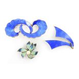 An enamel and silver brooch by Ivar T Holth, the stylised double swirl with applied blue guilloche