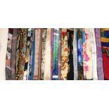 A collection of silk scarves, to include, a Mulberry England scarf decorated with flowers and