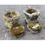 A pair of reconstituted stone planters, modelled as a pair of boots, 42cm long