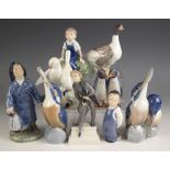 A collection of nine Royal Copenhagen porcelain figures and figural bird groups, 20th century, to