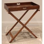 A mahogany butlers tray, 19th century, the rectangular tray with full gallery and kidney shaped hand