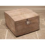 A 19th century oak carriage box or storage box, the sloping hinged cover with clasp lock opening