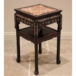 A Chinese rosewood and variegated marble jardinière/urn stand, late 19th/early 20th century, the