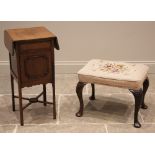 A George II influence dressing stool, 19th century and later, the tapestry seat upon leaf moulded