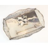 An Edwardian silver desk tidy, The Alexander Clark Manufacturing Co, Sheffield 1904, the shaped