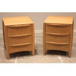 A pair of Ercol Savona light oak bedside cabinets, late 20th/early 21st century, each formed with