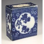 A Chinese porcelain blue and white flower brick, 20th century, of rectangular form with