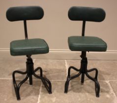 A pair of painted metal machinists chairs, mid 20th century, worn makers label 'Dual' to the rear,