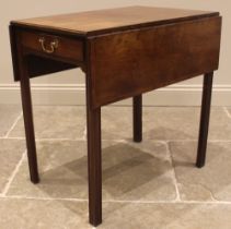 A George III mahogany Pembroke table, the rectangular cross banded top with two leaves above a