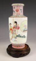 A Chinese porcelain rouleau vase, Republic Period style, decorated in the famille rose palette,
